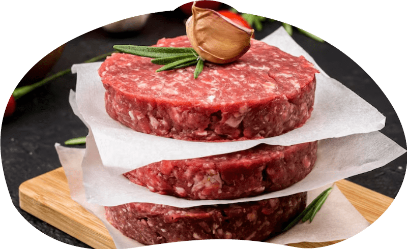 steaksHigh angle of meat with herbs and garlic High angle of meat with herbs and garlic
